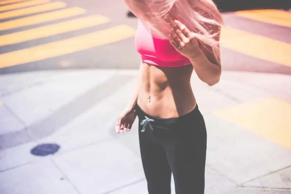 Woman with toned stomach after LA-EMS Body Sculpting Treatment Farnborough 